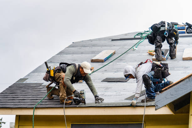Professional Emergency Roof Repair technician working in Millerton, NY